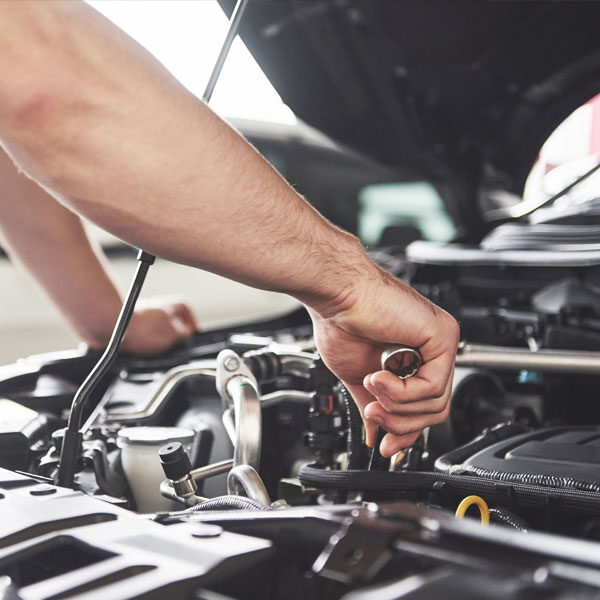 mechanic-repairing-a-car-at GT Automotive